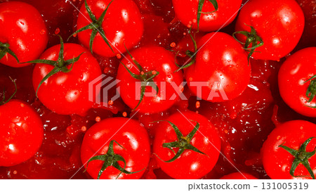 Freeze motion of falling fresh tomatoes into juice 131005319