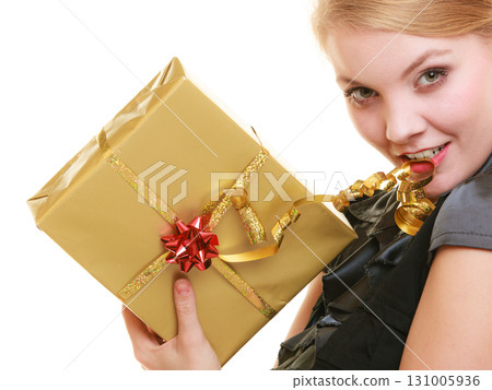 holidays love happiness concept - girl with gift box 131005936