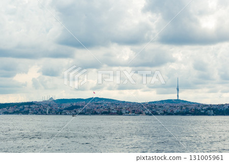 Istanbul, Turkey. Scenic view of the Bosphorus Strait with city view in the background. Urban skyline and city life. Istanbul, Turkey. Scenic view of the Bosphorus Strait with city view in the background. Urban skyline and city life. 131005961