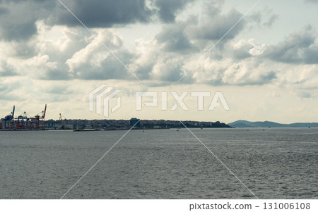 Istanbul, Turkey. Scenic view of the Bosphorus Strait with city view in the background. Urban skyline and city life. Istanbul, Turkey. Scenic view of the Bosphorus Strait with city view in the background. Urban skyline and city life. 131006108