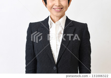Middle-aged business woman in a suit Middle-aged business woman in a suit 131006322