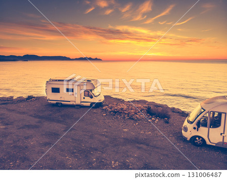Caravan on sea coast at sunrise. Aerial view 131006487