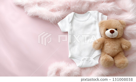 Cute baby onesie and teddy bear on soft pink background with fur 131008038