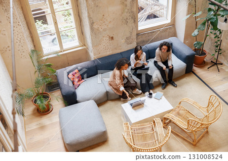 Engaging in a valuable and productive Collaborative Meeting within a Modern Workspace setting Engaging in a valuable and productive Collaborative Meeting within a Modern Workspace setting 131008524
