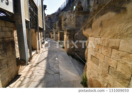 A corridor inside the Roman amphitheater in Nîmes, France (photographed on August 13, 2025) 131009050