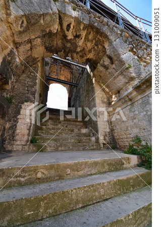A corridor inside the Roman amphitheater in Nîmes, France (photographed on August 13, 2025) 131009051