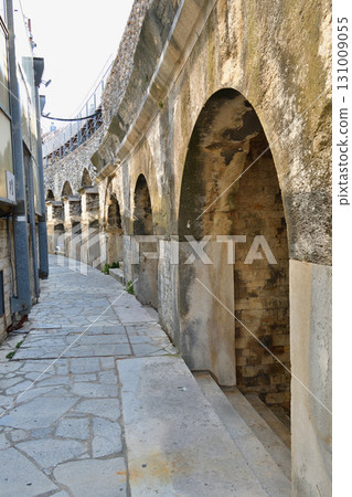 A corridor inside the Roman amphitheater in Nîmes, France (photographed on August 13, 2025) 131009055