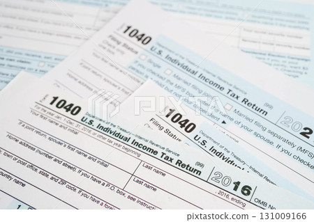 Tax form 1040 U.S. Individual Income Tax Return, business finance concept. Tax form 1040 U.S. Individual Income Tax Return, business finance concept. 131009166