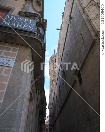 An alley near Santa Eulalia Cathedral in Barcelona, Spain, on a sunny day in May 131009400