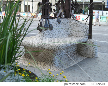 A bench on Passeig de Gracia in Barcelona, Spain, on a sunny day in May 131009501
