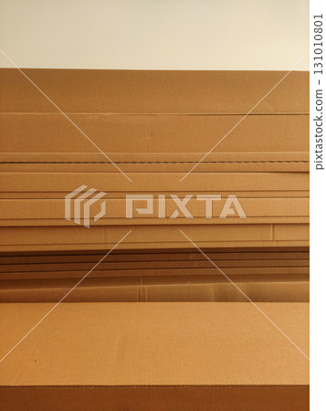 Stack of cardboard boxes forming a horizontal pattern Stack of cardboard boxes forming a horizontal pattern 131010801