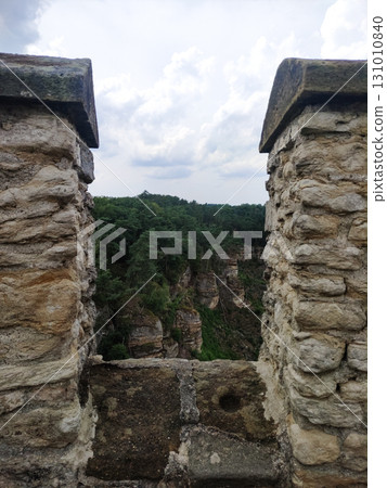 Kokorin castle sandstone walls framing picturesque czech landscape 131010840