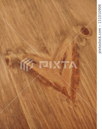 Heart shaped wood grain forming a natural valentine on a wooden plank Heart shaped wood grain forming a natural valentine on a wooden plank 131010906