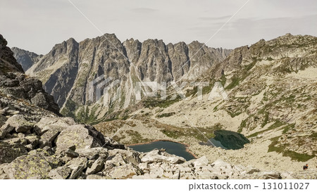 Hiking trail leading to glacial lake in the high tatras mountains, slovakia Hiking trail leading to glacial lake in the high tatras mountains, slovakia 131011027
