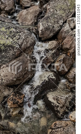 Water flowing down rocks in high tatras mountains, slovakia 131011043