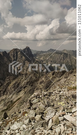 Hiking trail overlooking majestic mountain peaks in high tatras, slovakia 131011062