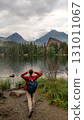 Tourist walking near strbske pleso in high tatras mountains, slovakia 131011067