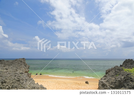 People enjoying snorkeling in the clear waters of Shimanakahama Beach on Hatoma Island 131011575