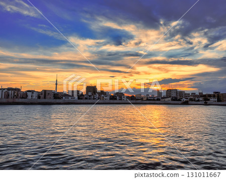 Clouds dyed in the sunset and Skytree as seen from Nakagawa River Clouds dyed in the sunset and Skytree as seen from Nakagawa River 131011667