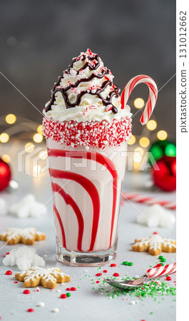Festive Creamy Christmas Milkshake Dessert with Candy Cane and Holiday Cookies 131012662
