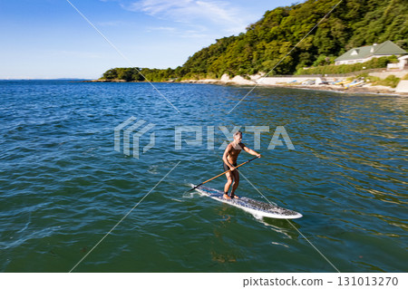 Senior man enjoying marine sports in the sea Senior man enjoying marine sports in the sea 131013270