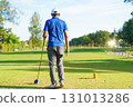 Asian male amateur golfer is enjoy playing golf at golf course in morning, he is showing his beautiful swing during tee off. Man playing golf. 131013286