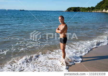 Portrait of a senior man with a well-trained body at the seaside Portrait of a senior man with a well-trained body at the seaside 131013339