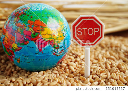 Bangkok, Thailand March 12, 2023 Wheat grains with stop sign, trade export and economy concept. Bangkok, Thailand March 12, 2023 Wheat grains with stop sign, trade export and economy concept. 131013537