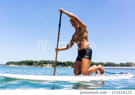 Senior man enjoying marine sports in the sea Senior man enjoying marine sports in the sea 131014125