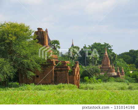 View of overgrown Buddhist temples in Bagan View of overgrown Buddhist temples in Bagan 131014198