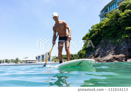 Senior man enjoying marine sports in the sea 131014213