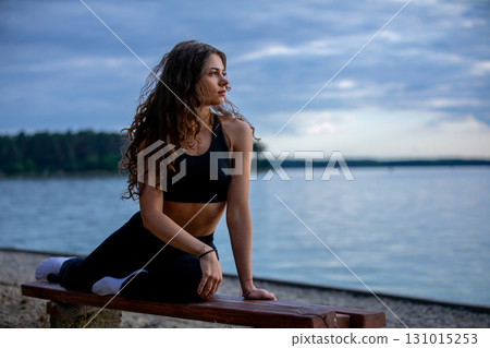 Experience Serene Yoga by the Lake at Dusk for a peaceful and tranquil evening session 131015253