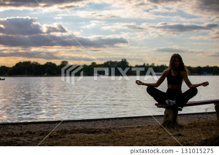 Engage in Sunset Meditation by the Waters Edge for peace and calm as you breathe deeply Engage in Sunset Meditation by the Waters Edge for peace and calm as you breathe deeply 131015275