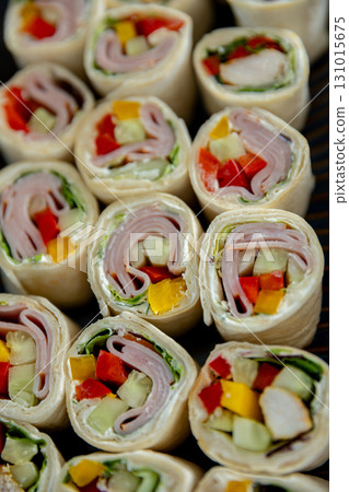 Enjoy these Delicious Wraps filled with Fresh Vegetables and Savory Ham for any occasion Enjoy these Delicious Wraps filled with Fresh Vegetables and Savory Ham for any occasion 131015675