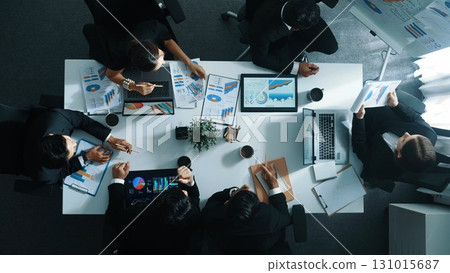 Top view of investor handed document to manager while explain idea. Directorate. 131015687