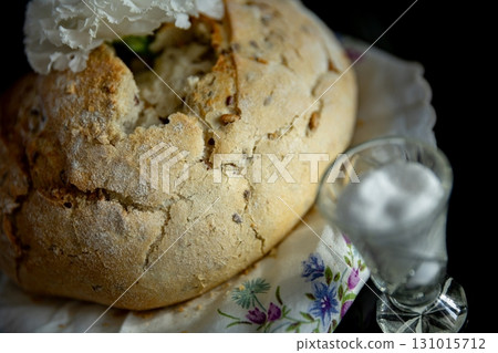 Delicious and Homemade Bread Featuring Decorative Cream and Sweet Sugar for Flavor 131015712
