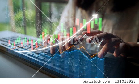 Person Typing on Keyboard with Digital Financial Graphs Showing Growth in Background for Business and Investment Concept in Modern Office Copula Person Typing on Keyboard with Digital Financial Graphs Showing Growth in Background for Business and Investment Concept in Modern Office Copula 131015925