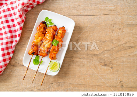 grilled chicken skewer with herbs and spices grilled chicken skewer with herbs and spices 131015989