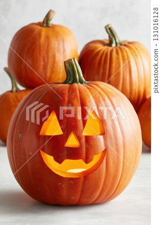 A Festively Carved Pumpkin with a Cheerful, Happy Face Perfect for Halloween Celebrations A Festively Carved Pumpkin with a Cheerful, Happy Face Perfect for Halloween Celebrations 131016128
