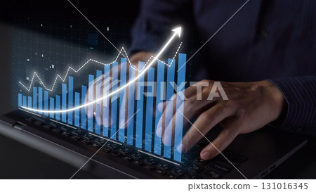 Hands Typing on Laptop with Digital Graphs and Data Analytics Display for Financial Growth and Business Performance Monitoring Copula 131016345