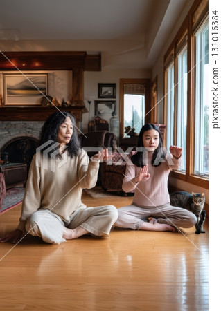 Engaging in a Heartfelt Mother and Daughter Mindfulness Practice Together at Home Engaging in a Heartfelt Mother and Daughter Mindfulness Practice Together at Home 131016384