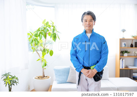 House cleaning: Middle-aged man in work clothes House cleaning: Middle-aged man in work clothes 131017597