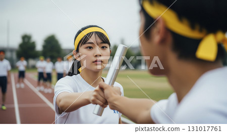Handing the baton to the next runner Sports festival Athletic meet 131017761