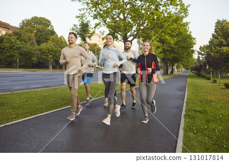 Athlete Team Running Together Outdoors Athlete Team Running Together Outdoors 131017814