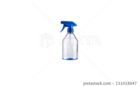 Isolated blue plastic spray bottle filled with clear cleaning solution placed on white background. 131018047