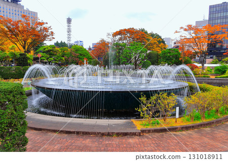 City Hall Garden with a fountain and vibrant autumn foliage in the cityscape City Hall Garden with a fountain and vibrant autumn foliage in the cityscape 131018911