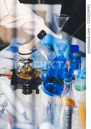 Researchers working in the clinical laboratory 131019441