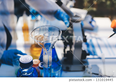 Researchers working in the clinical laboratory 131019445