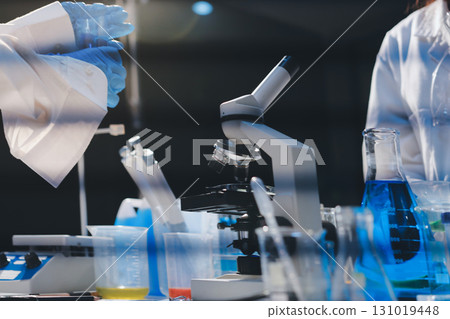 Researchers working in the clinical laboratory 131019448