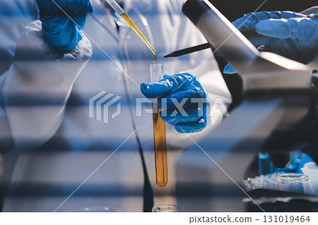 Researchers working in the clinical laboratory 131019464